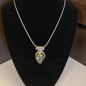 Silver and turquoise pendant.